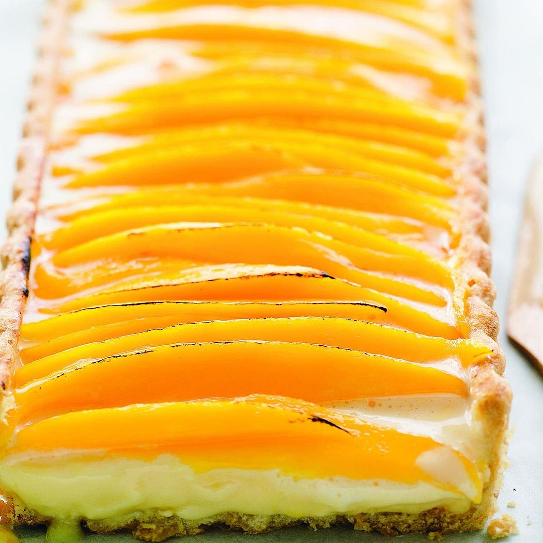 Mango and lemongrass tart with coconut pastry
