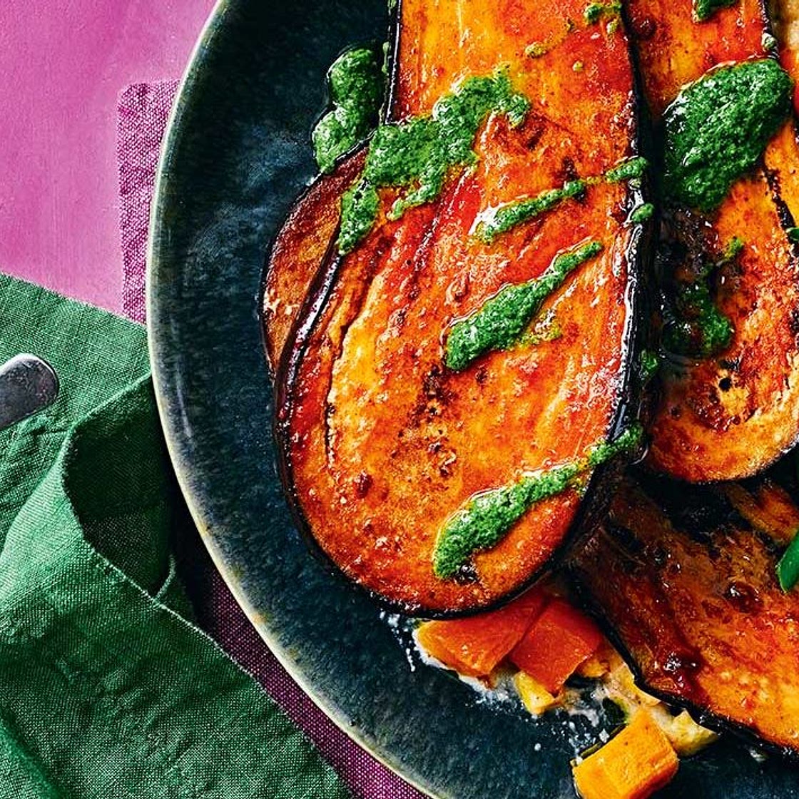 Chipotle aubergine steak with creamed corn and a herby green sauce