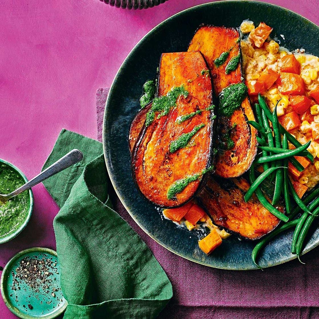 Chipotle aubergine steak with creamed corn and a herby green sauce
