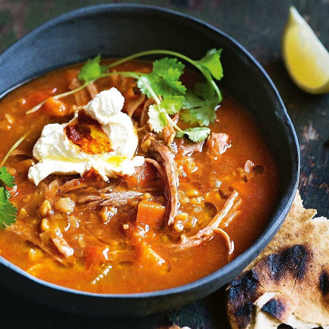 Slow-cooker spiced split-pea soup with harissa labneh