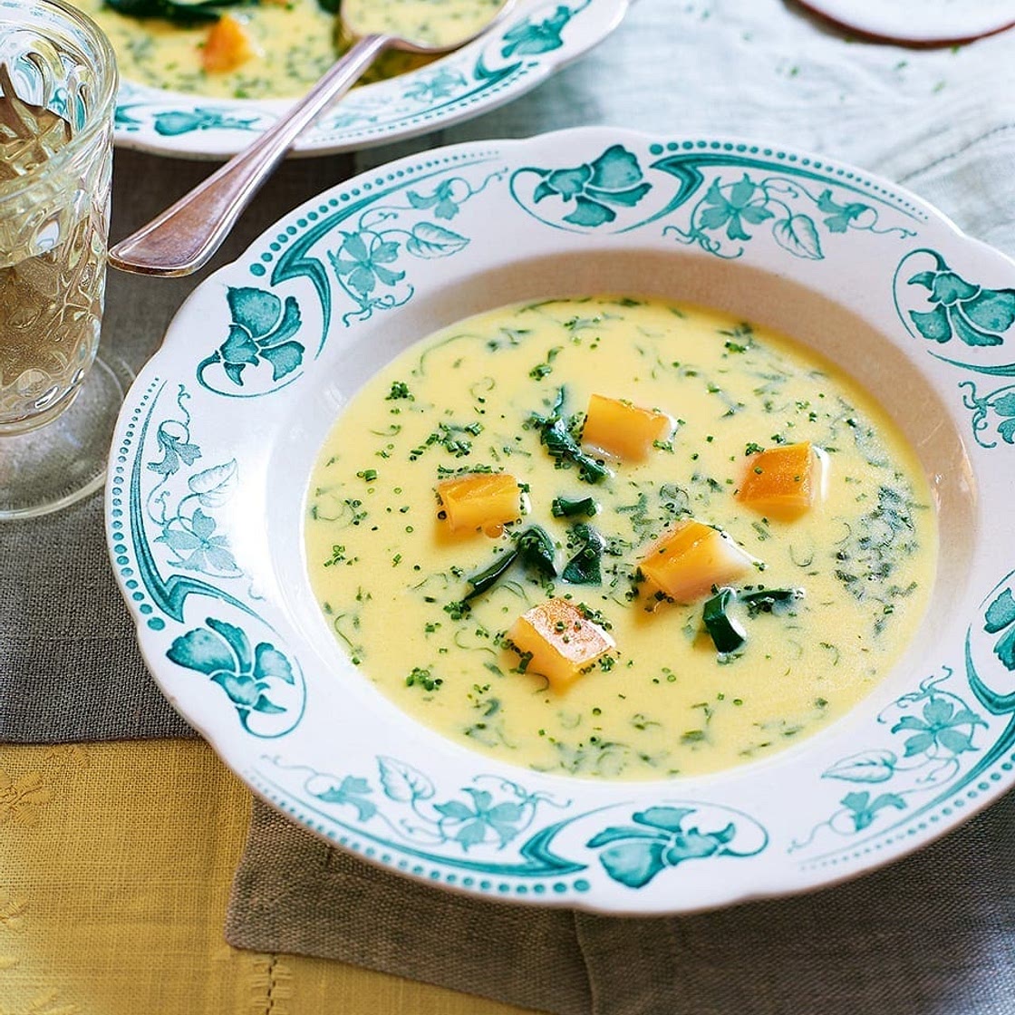 Smoked haddock soup with fresh herbs and spinach