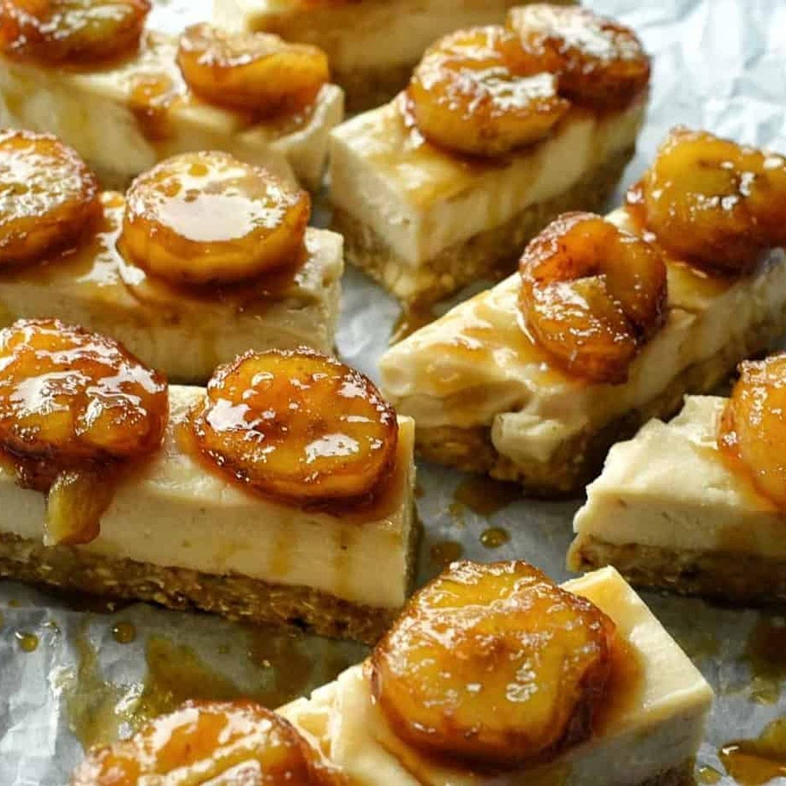 Raw coconut cheesecake bars with rum flambe bananas