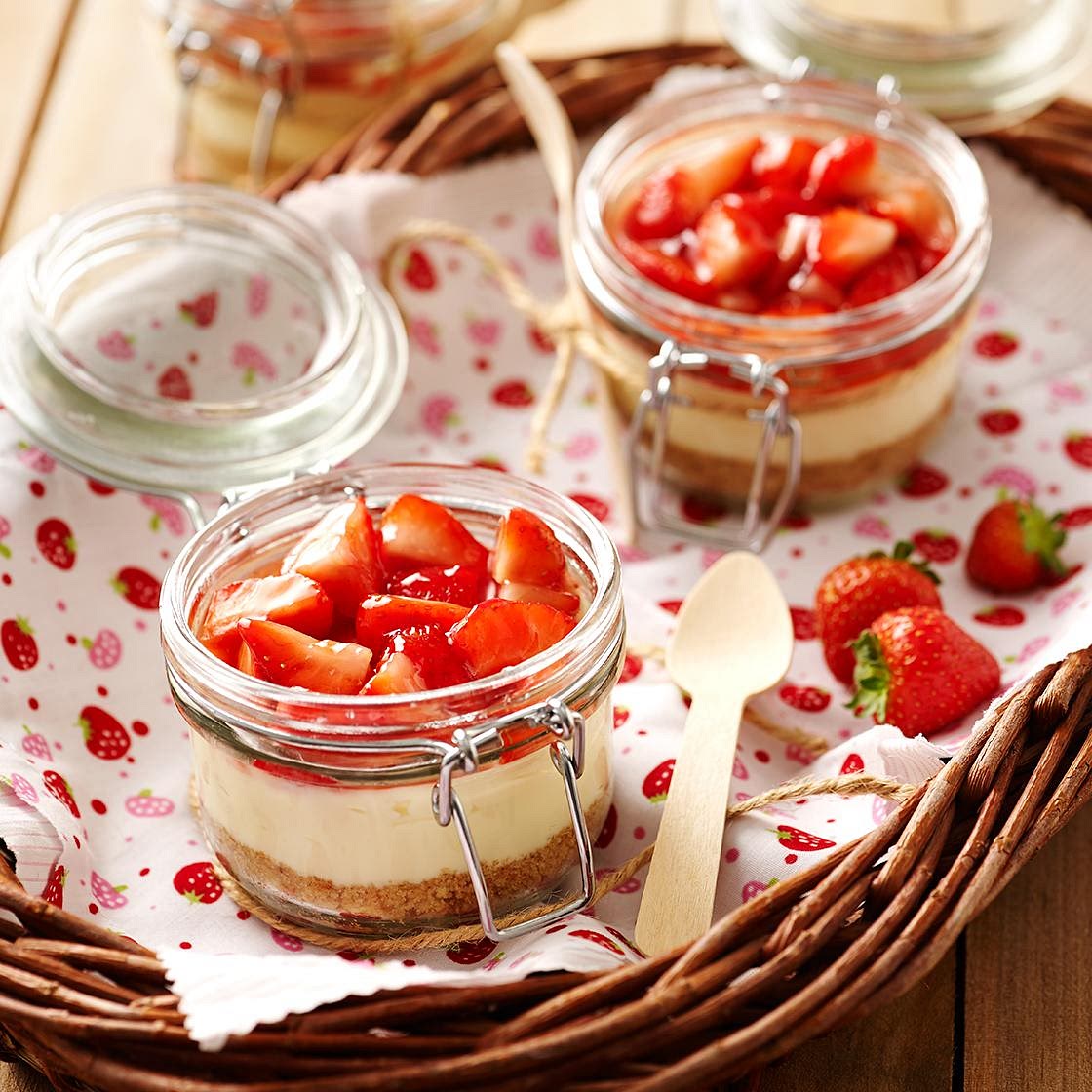 Individual strawberry and cream cheesecakes