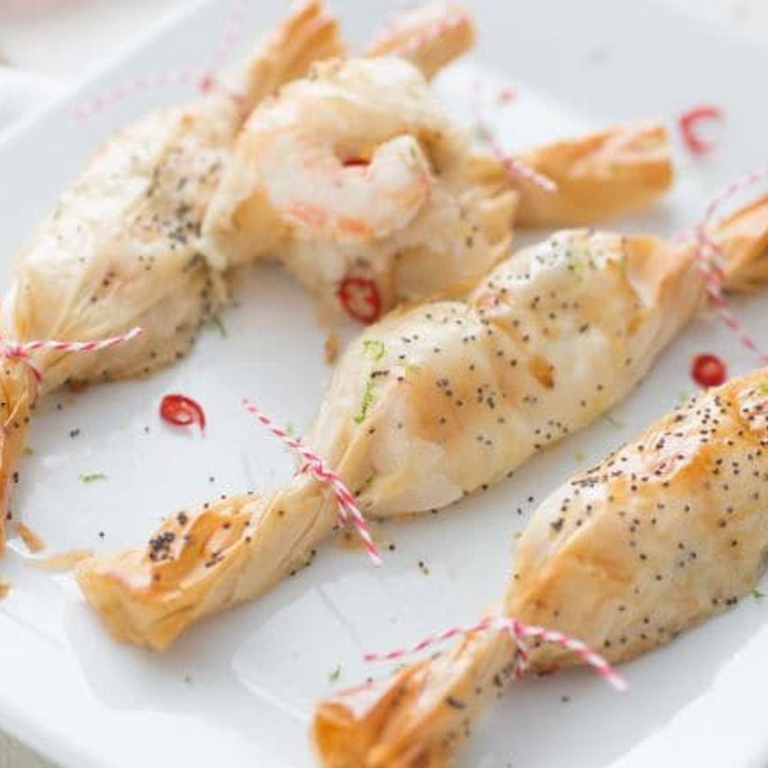 Pacchetti natalizi con scampi, zenzero e lime