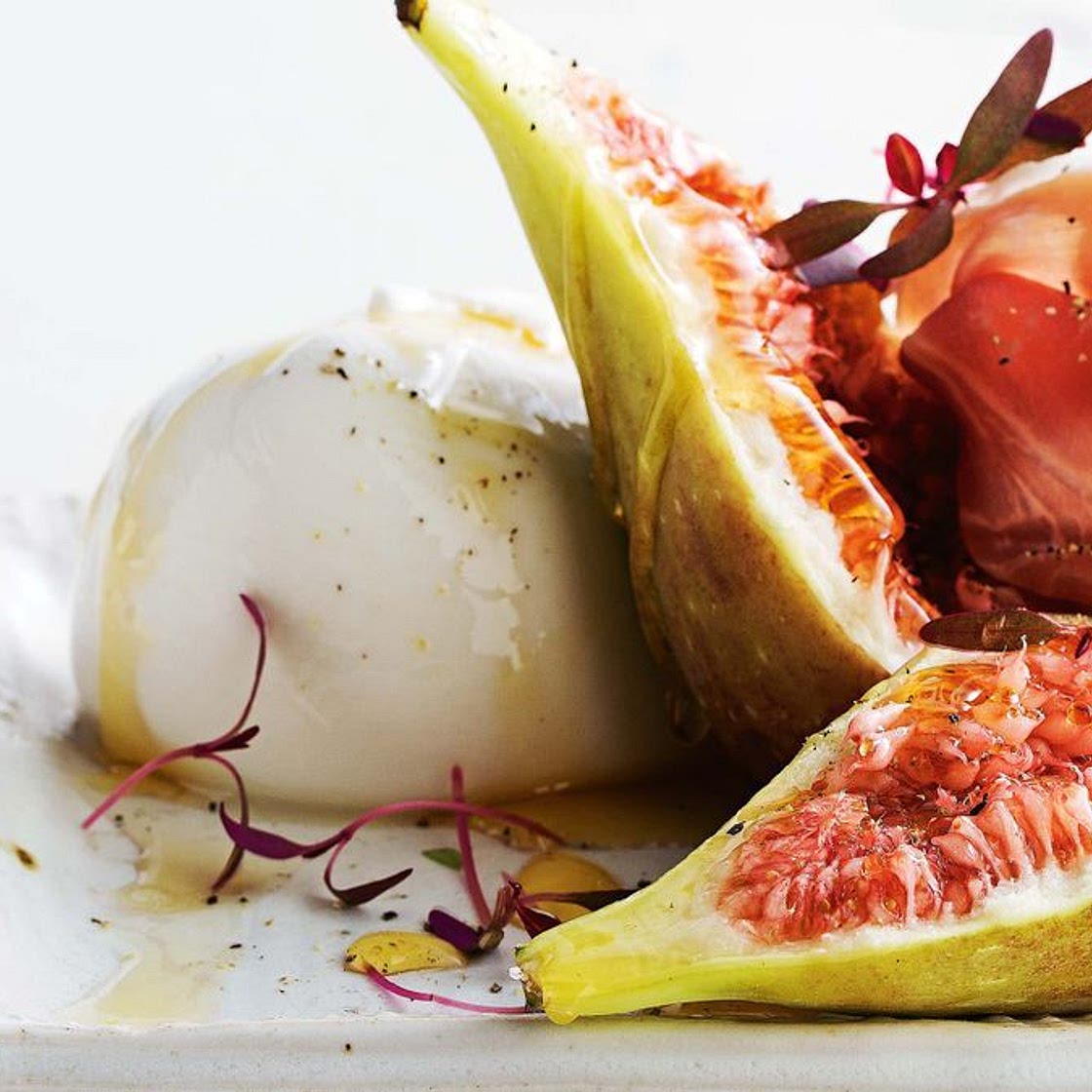 Buffalo mozzarella with figs, prosciutto and honey
