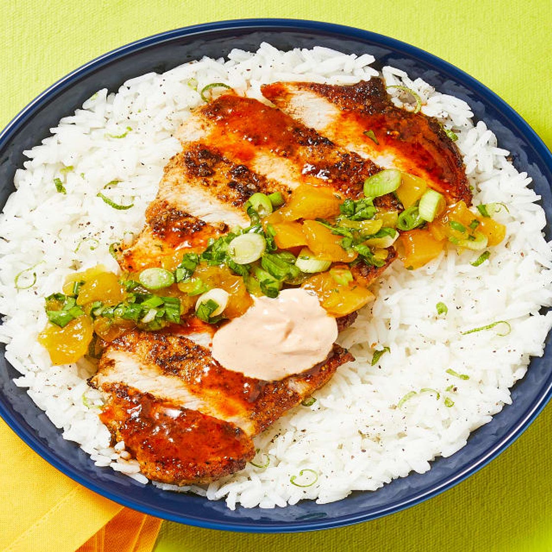 Tex-Mex Pork with Mango Salsa with Zesty Lime Rice & Smoky Red Pepper Crema