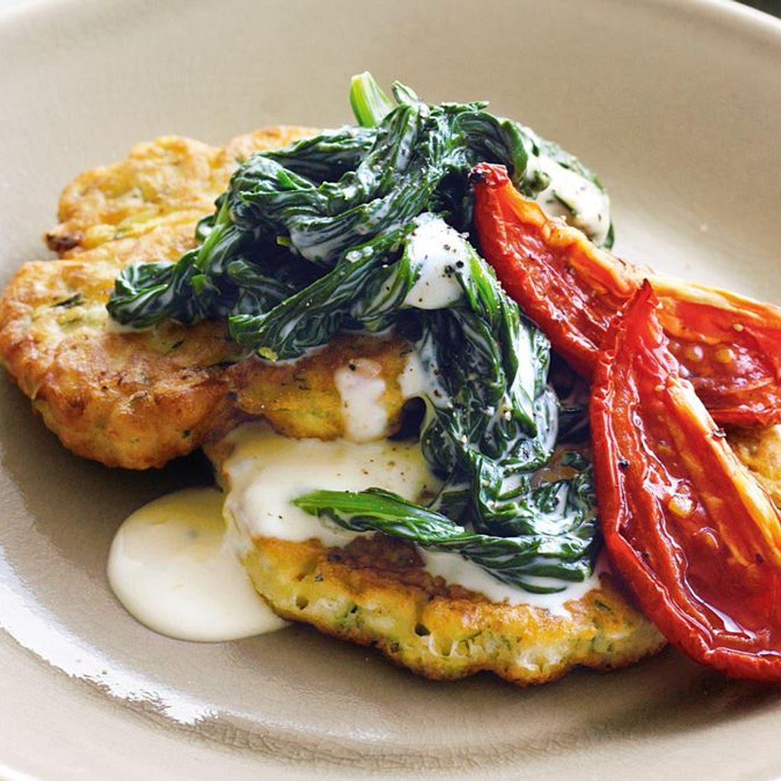 Zucchini cakes with slow-roasted tomatoes & lemon creamed spinach