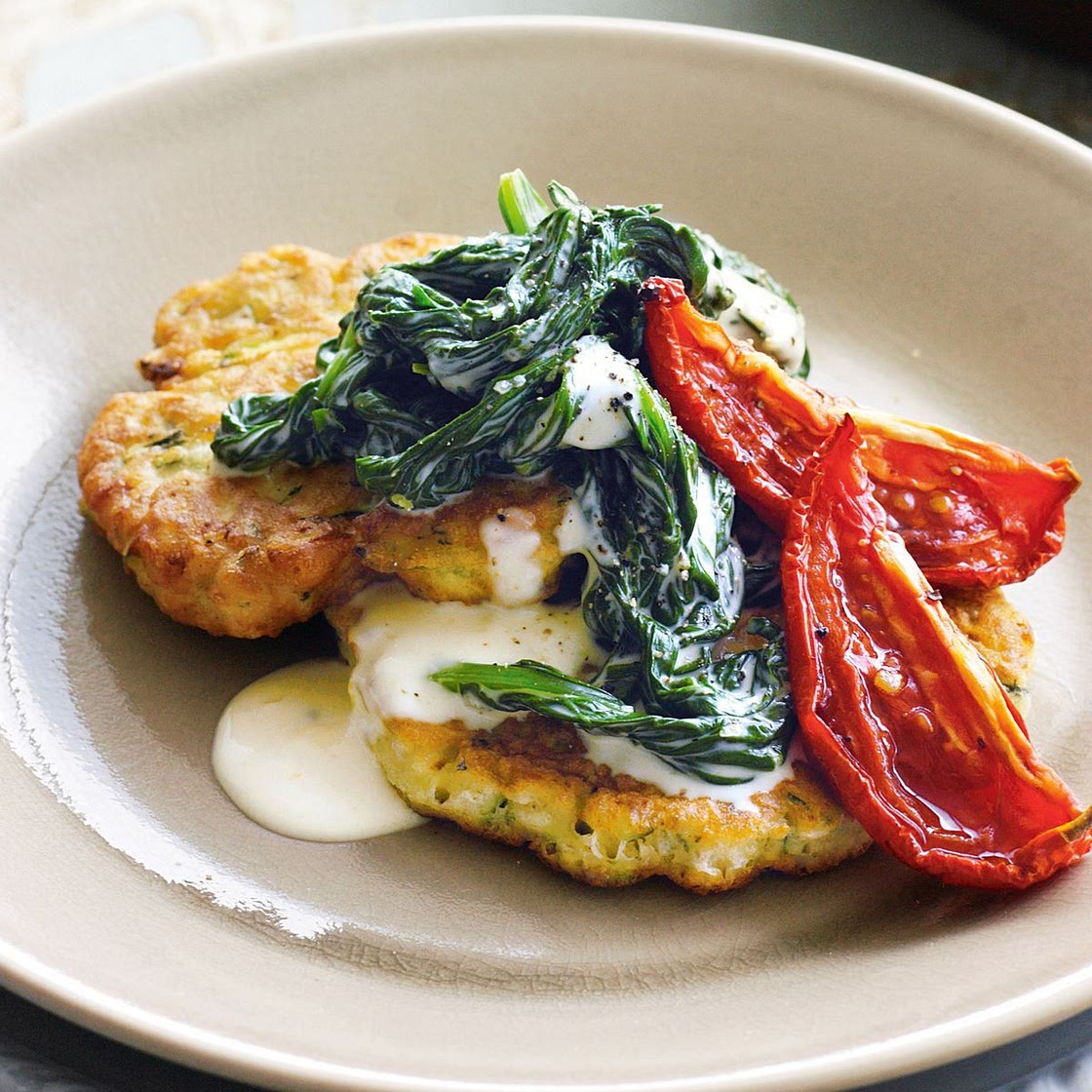 Zucchini cakes with slow-roasted tomatoes & lemon creamed spinach