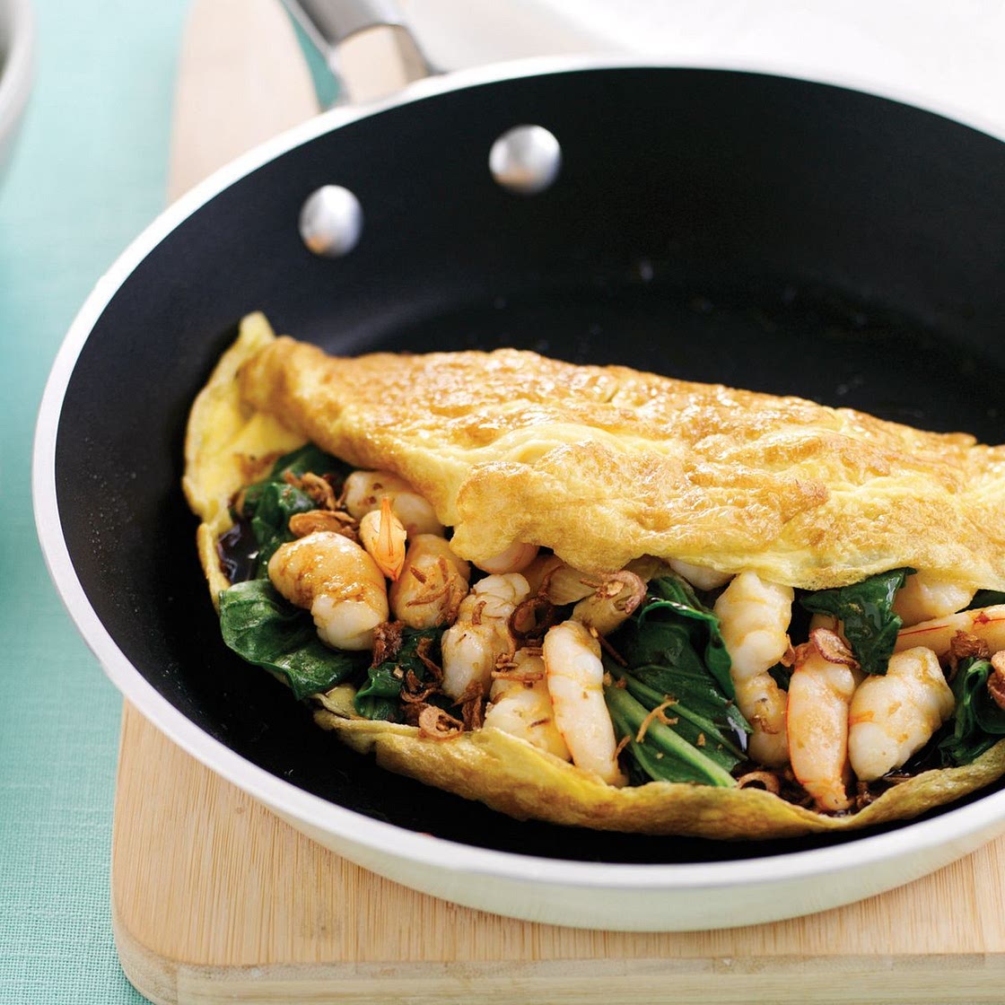Omelette with garlic prawns and choy sum
