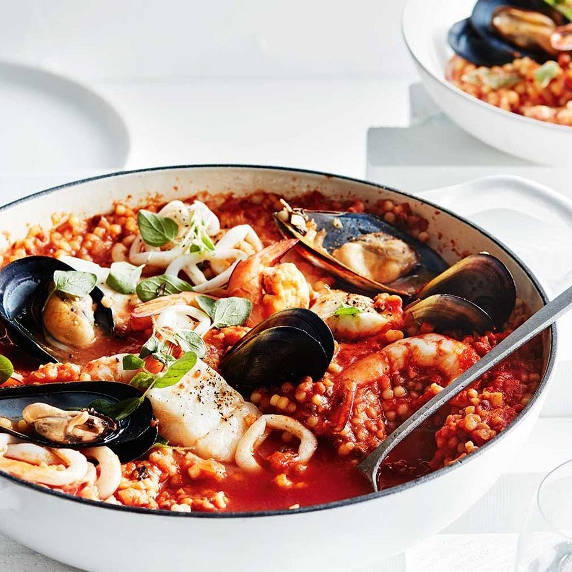 Seafood and tomato fregola