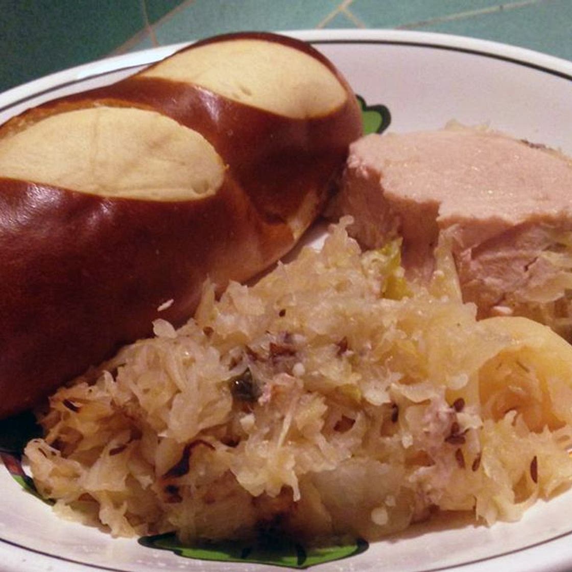 Slow Cooker German-Style Pork Roast with Sauerkraut and Potatoes