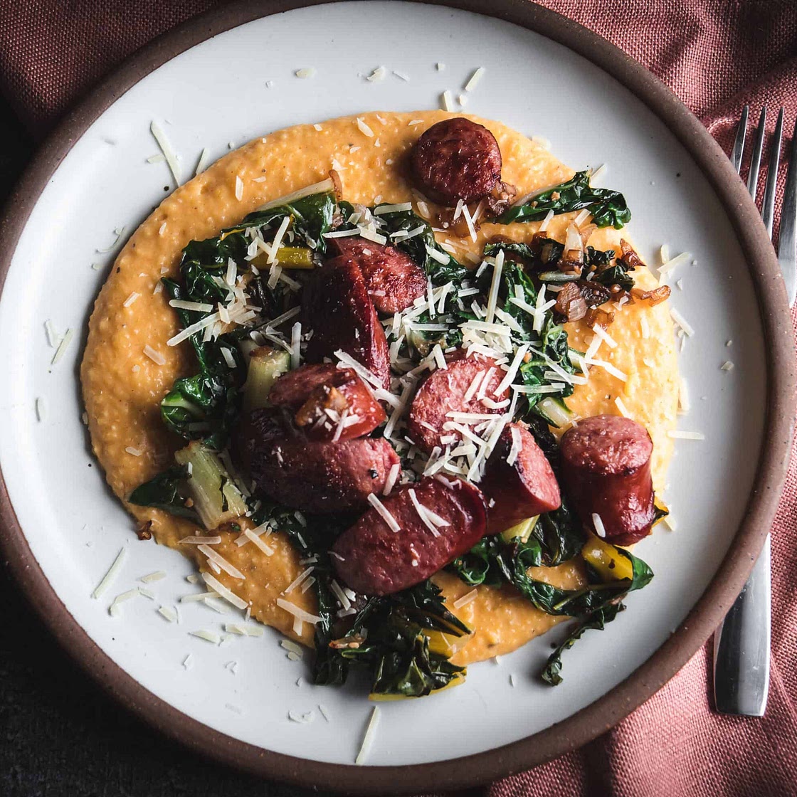 Sweet Potato Polenta with Smoked Sausage and Chard