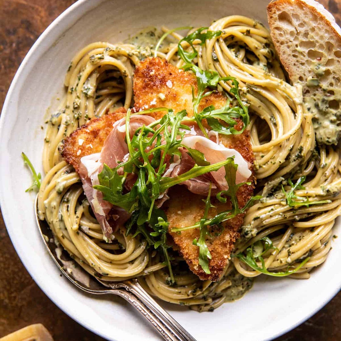 Basil Parmesan Pasta with Crispy Chicken, Prosciutto, and Arugula