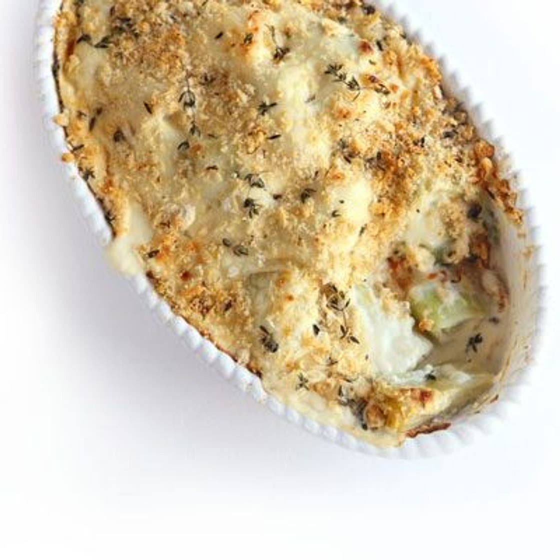 Creamy baked leeks with citrus crumbs