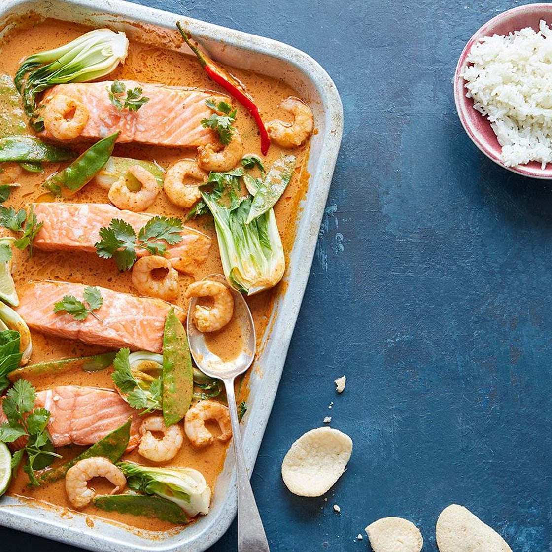 Fragrant coconut, salmon & prawn traybake