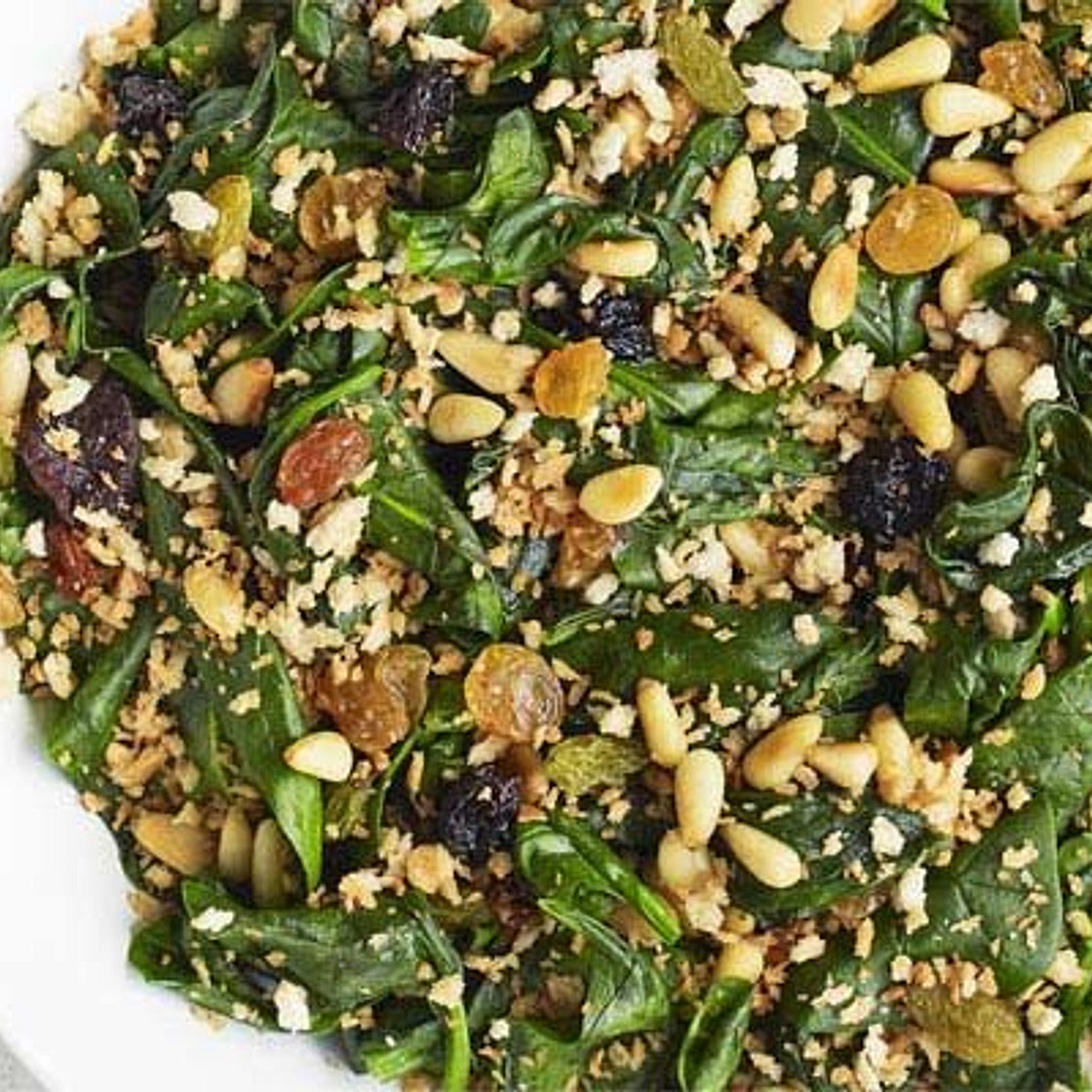 Spinach with raisins, pine nuts & breadcrumbs