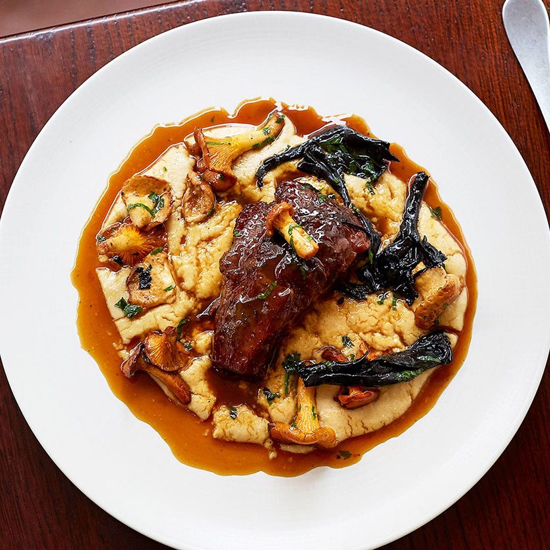 Braised beef cheeks with polenta, coffee & wild mushrooms