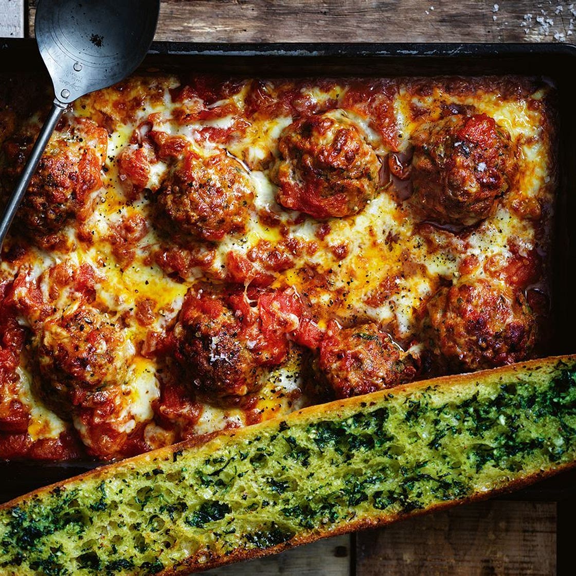 Oven-roasted chorizo meatballs with tomato ragu and herby garlic bread