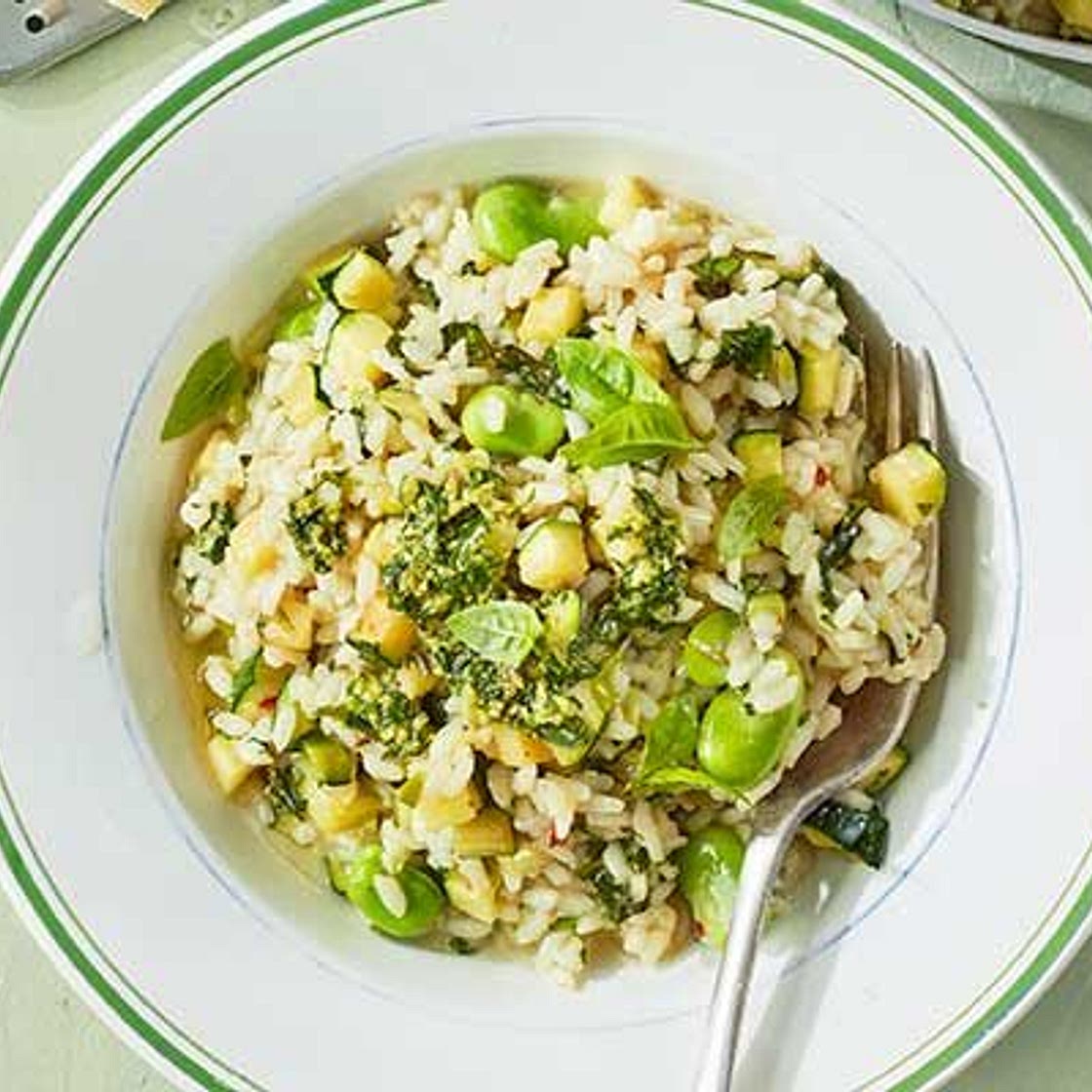 Courgette & broad bean risotto with basil pesto