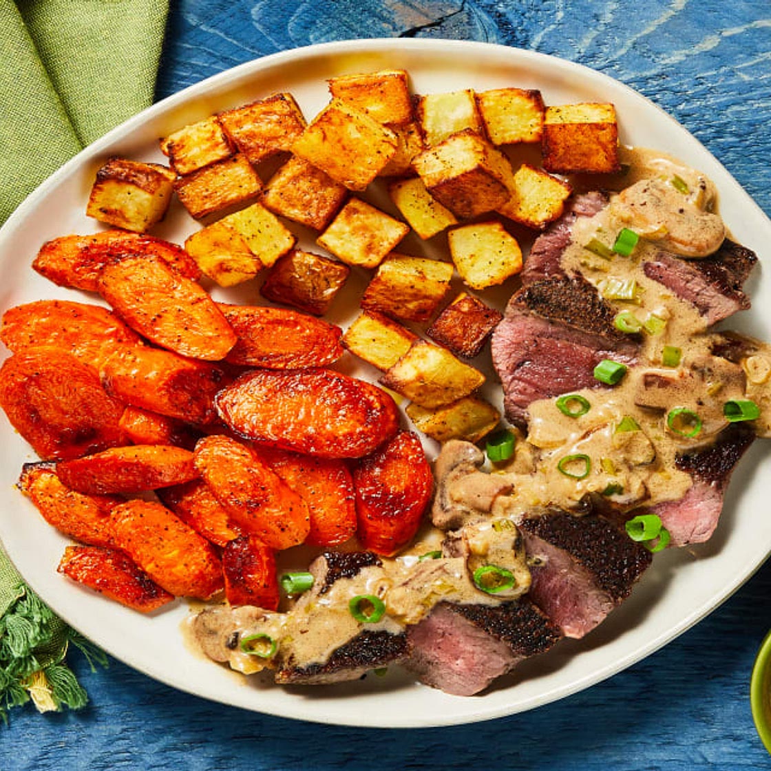 Steak with Mushroom Cream Sauce plus Roasted Potatoes & Carrots