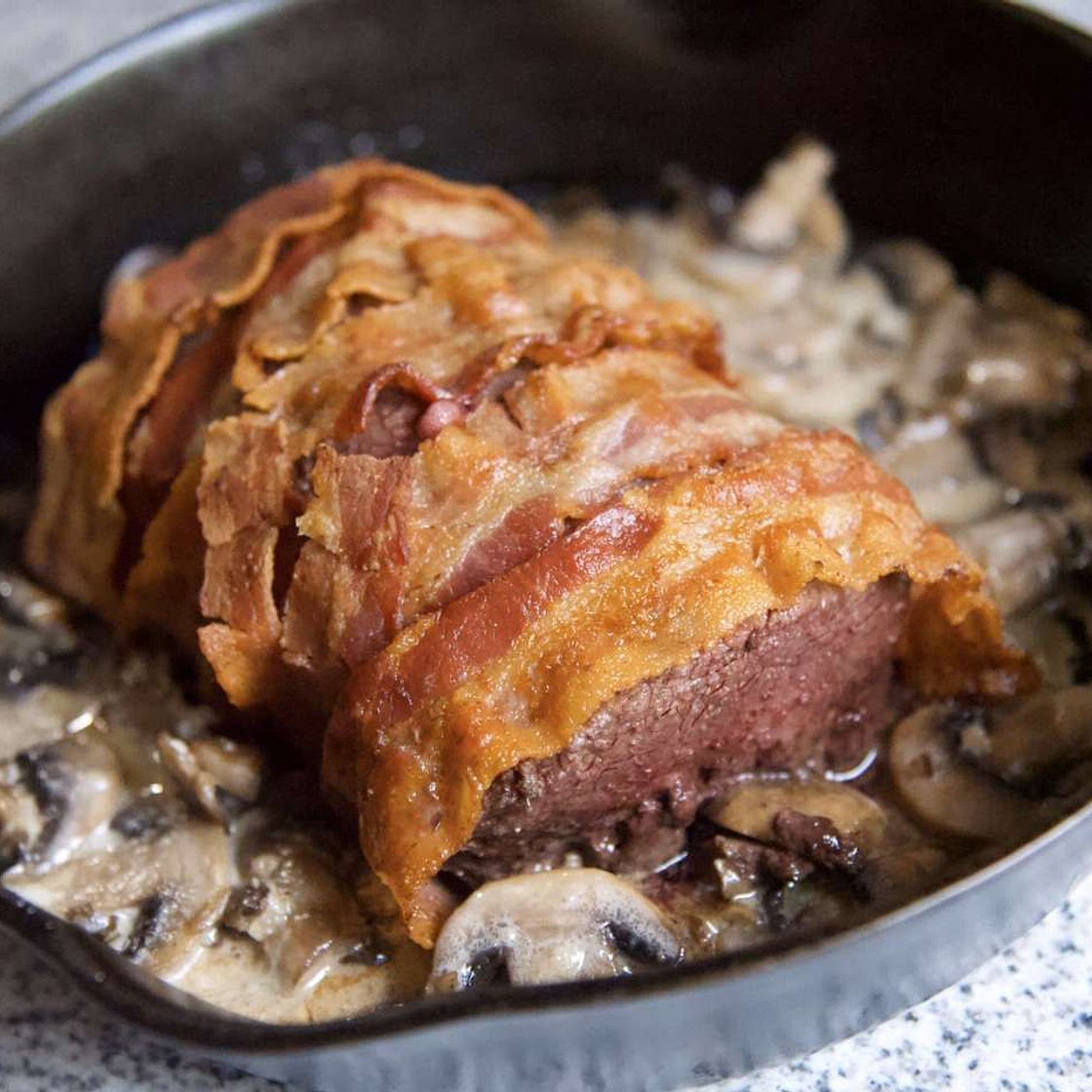 Bacon-Wrapped Venison Tenderloin with Garlic Cream Sauce