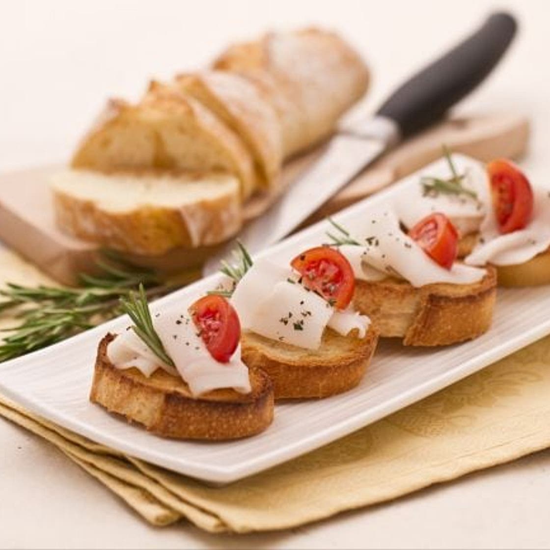 Bruschette al lardo e rosmarino