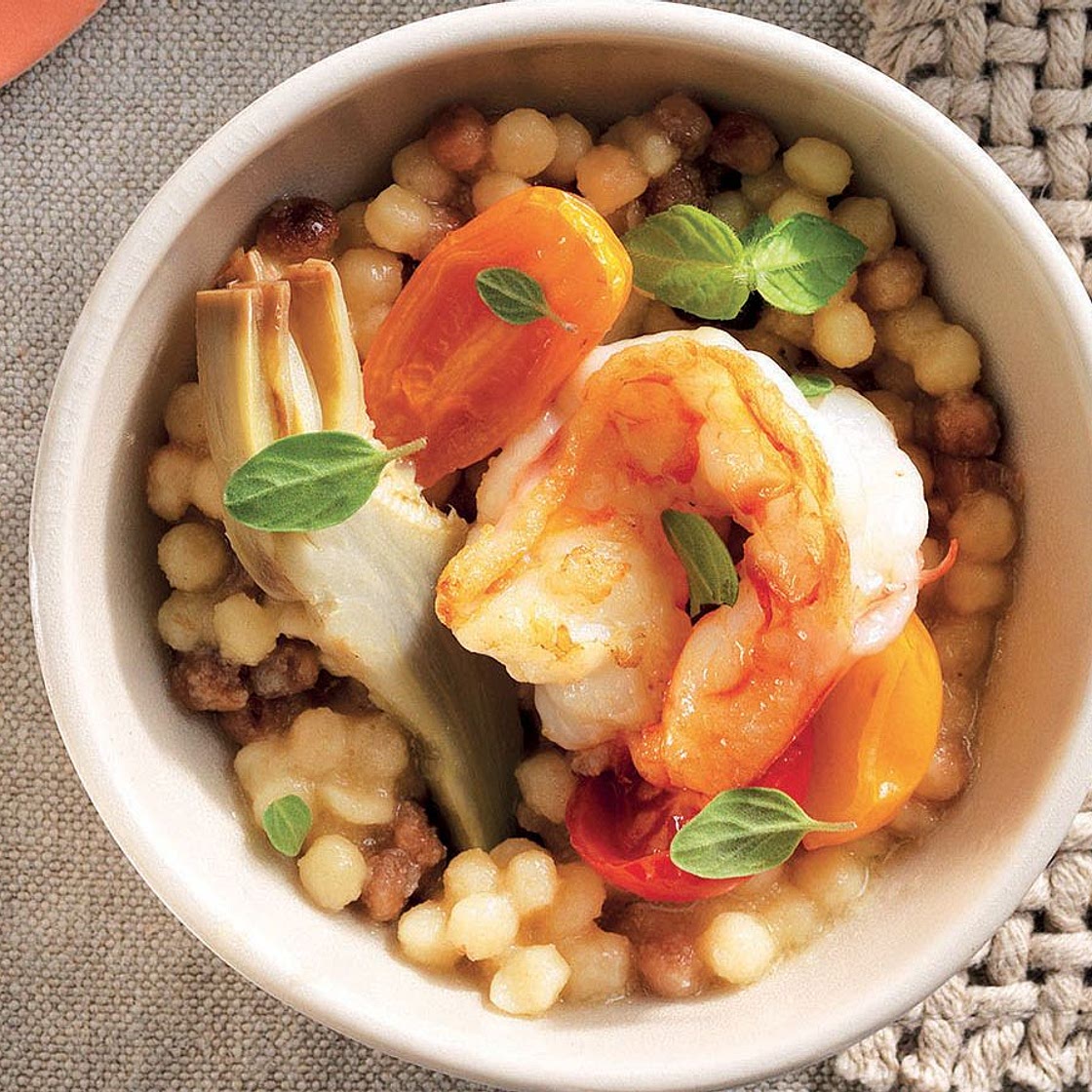 Fregola con gamberi, carciofi e pomodorini