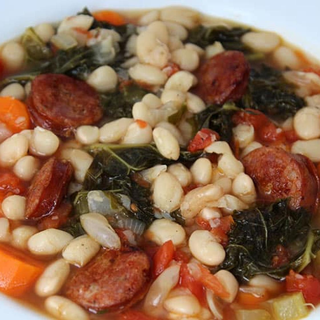 Pressure Cooker White Bean Soup with Crispy Sausage and Kale
