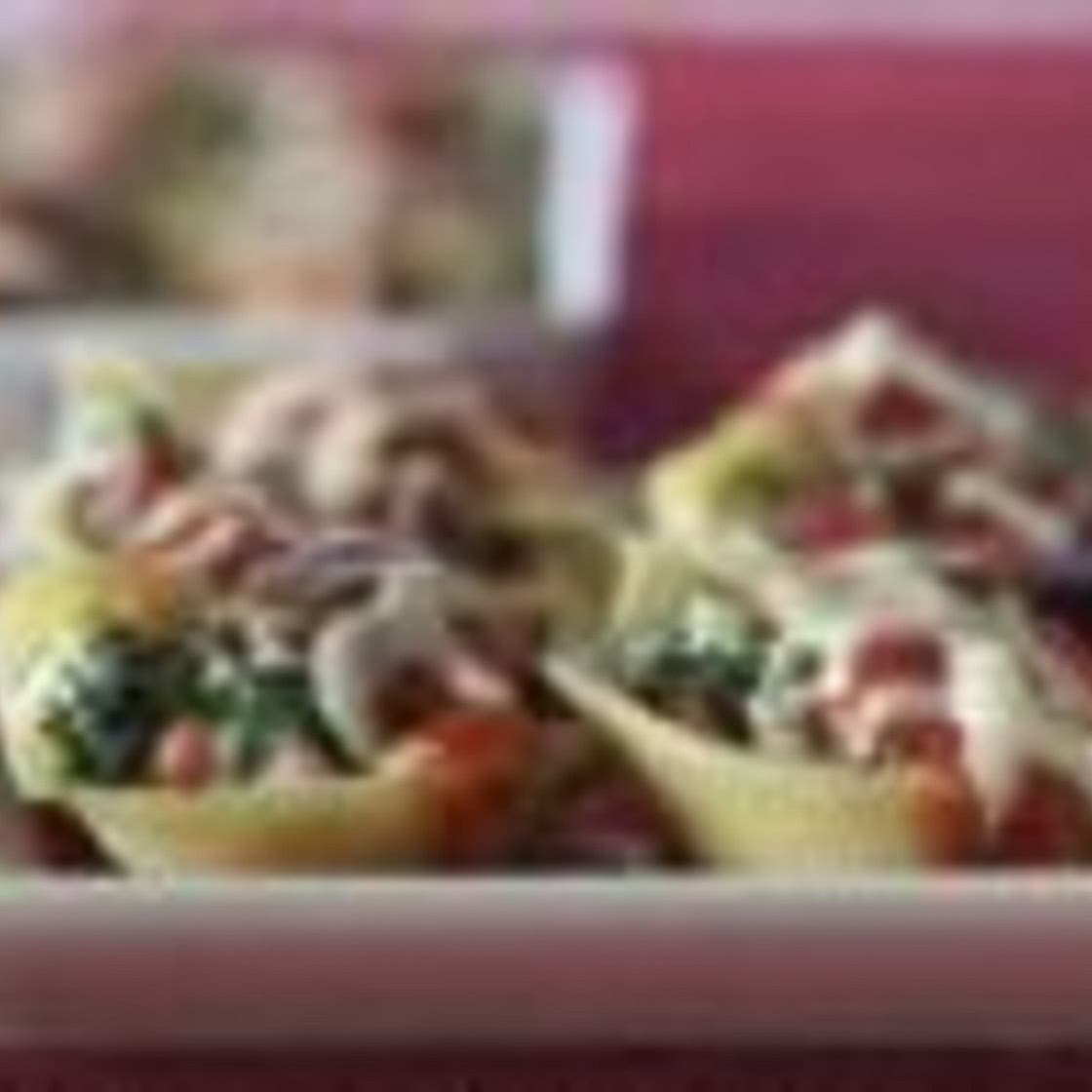 Sausage and Eggplant-Stuffed Shells in Tomato-Basil Cream Sauce
