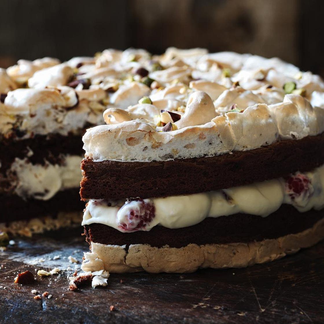 Chocolate brownie meringue cake with raspberry cream