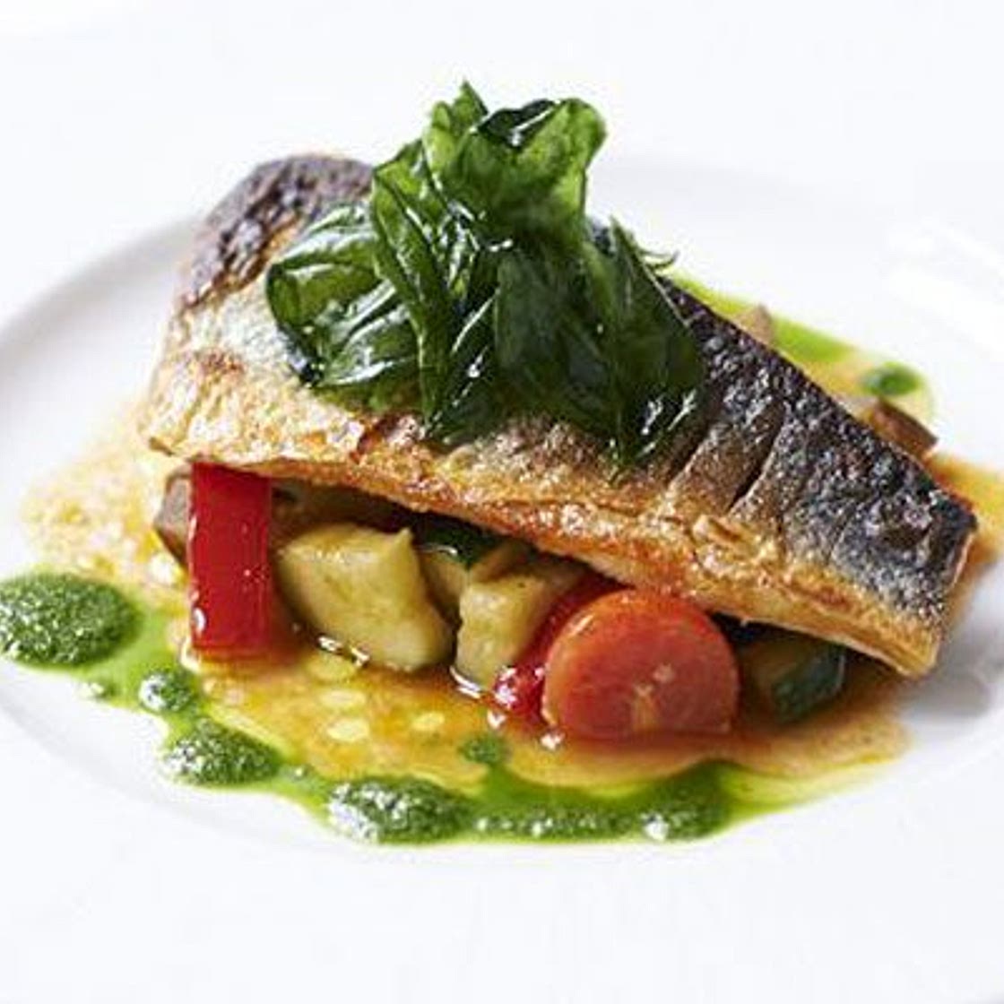 Pan-fried sea bass with ratatouille & basil