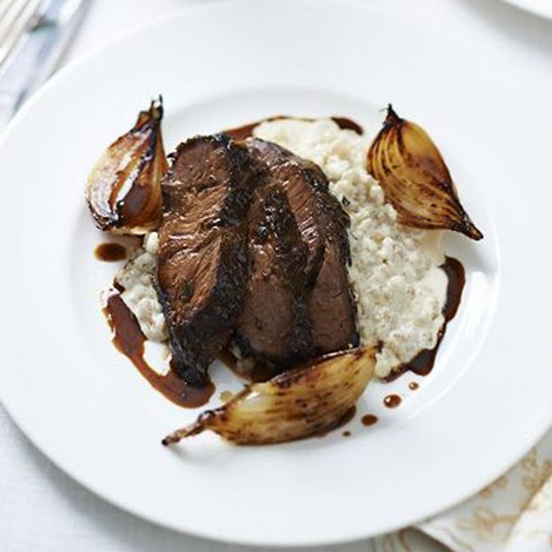 Beer-braised beef cheek, pearl barley risotto, malted onions & ale sauce