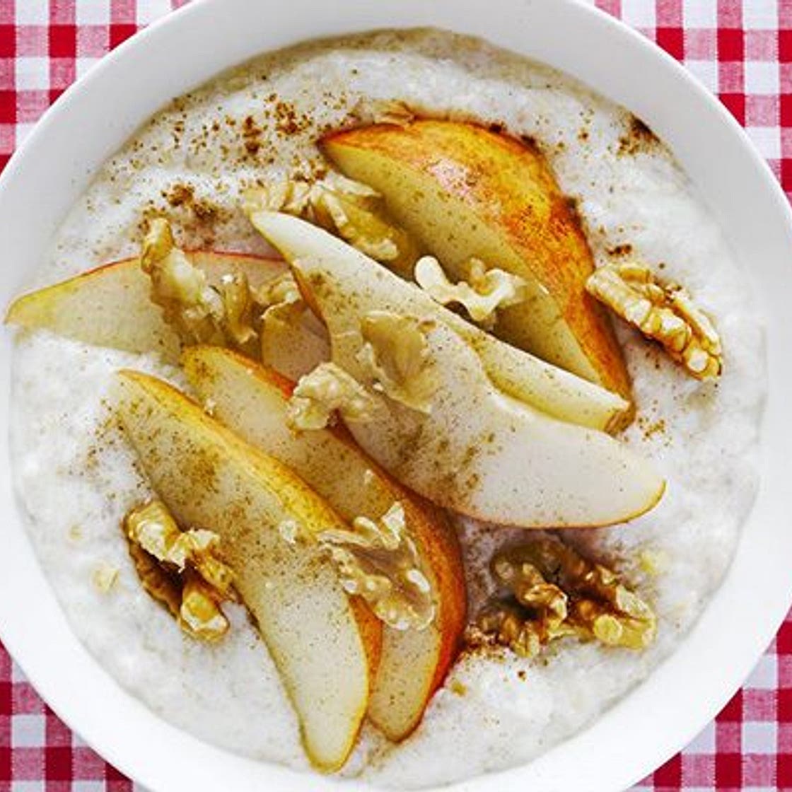 Creamy yogurt porridge with pear, walnut & cinnamon topping