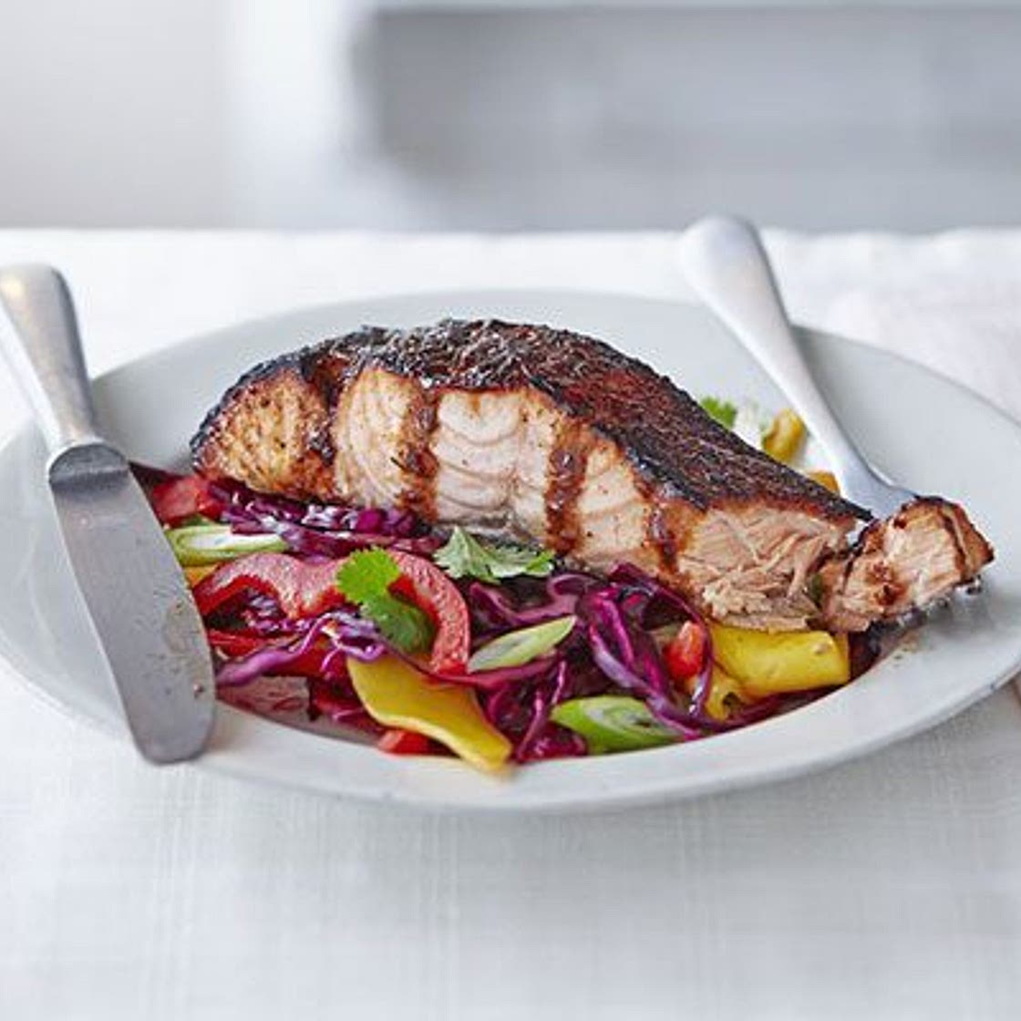 Sticky jerk salmon with mango slaw