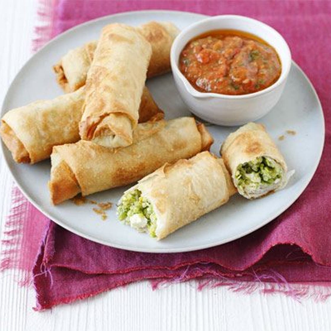 Pea, feta & quinoa spring rolls with roast tomato nam prik