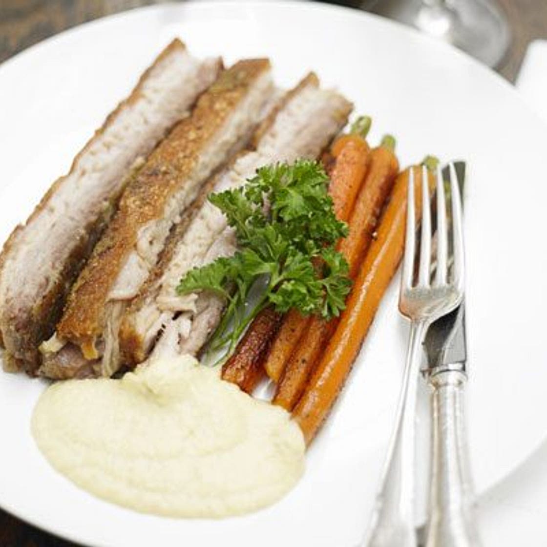 Twice-cooked pork belly with an onion & apple velouté