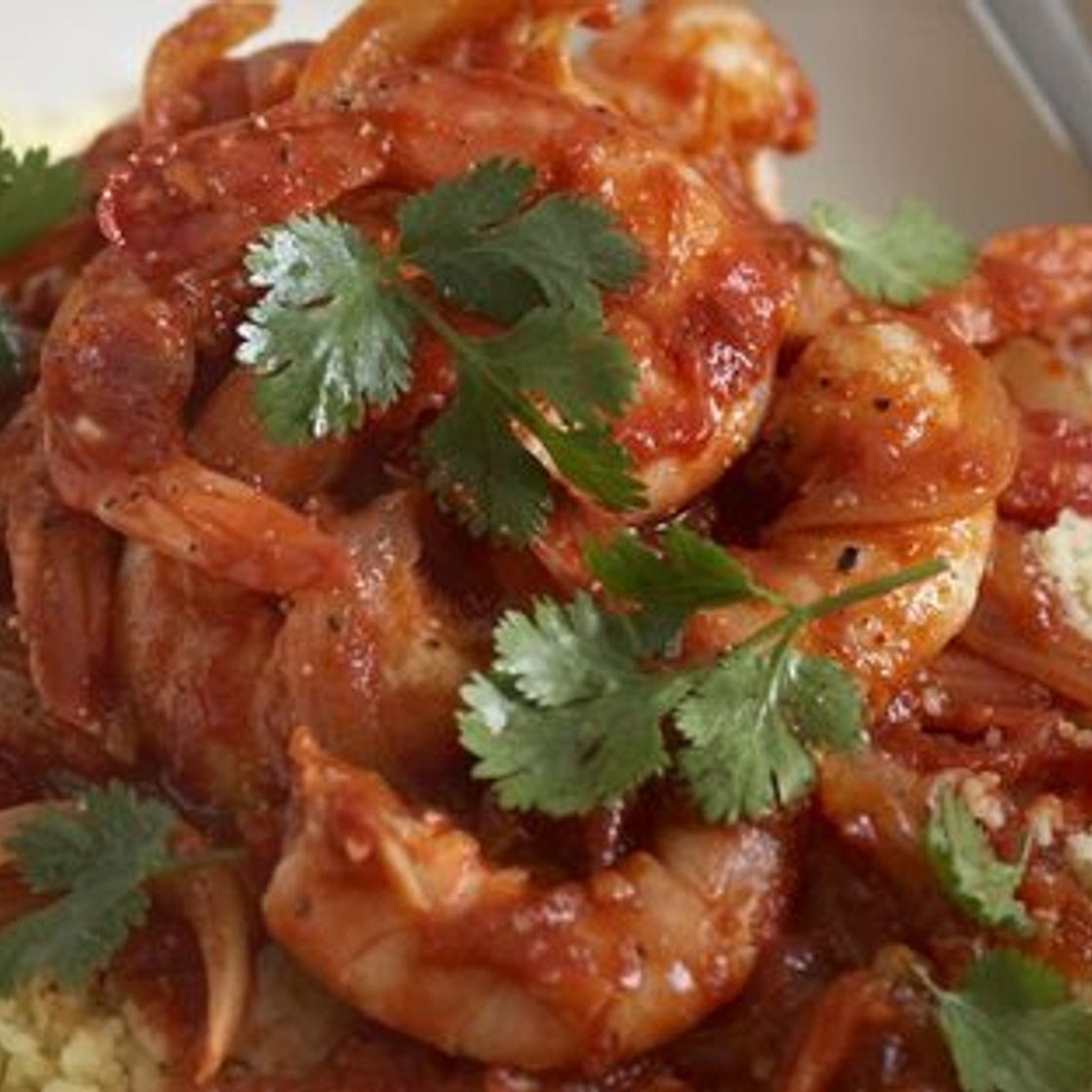 Prawn and harissa stew with couscous