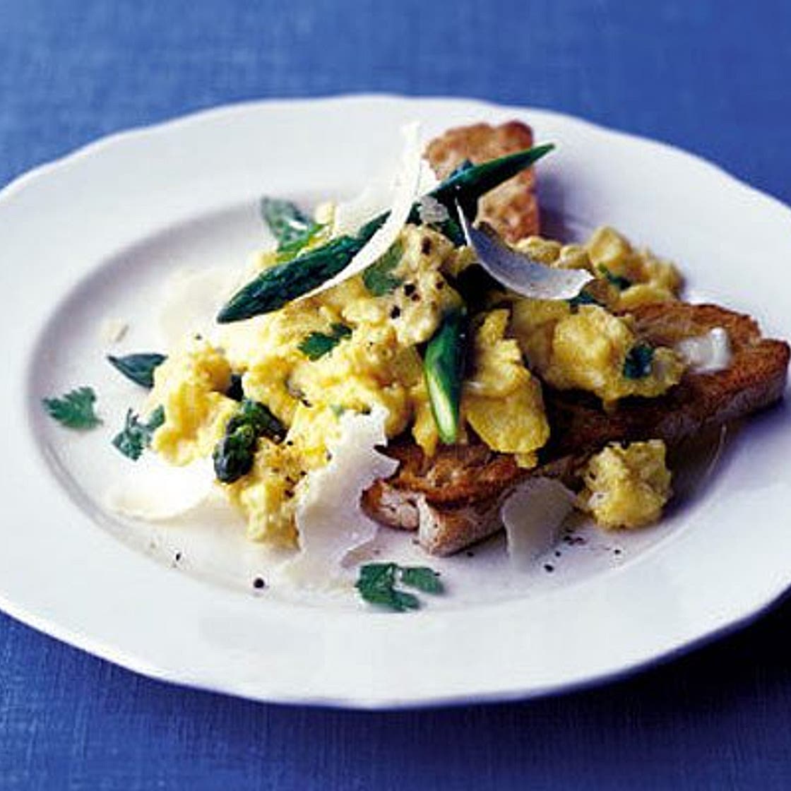 Soft herb scrambled egg with asparagus