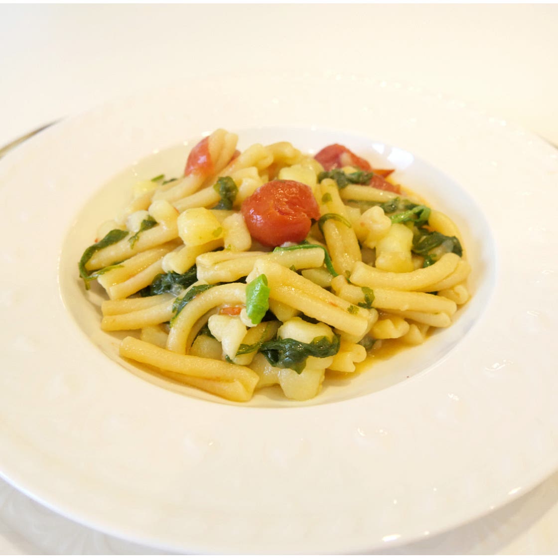Pasta con patate e rucola