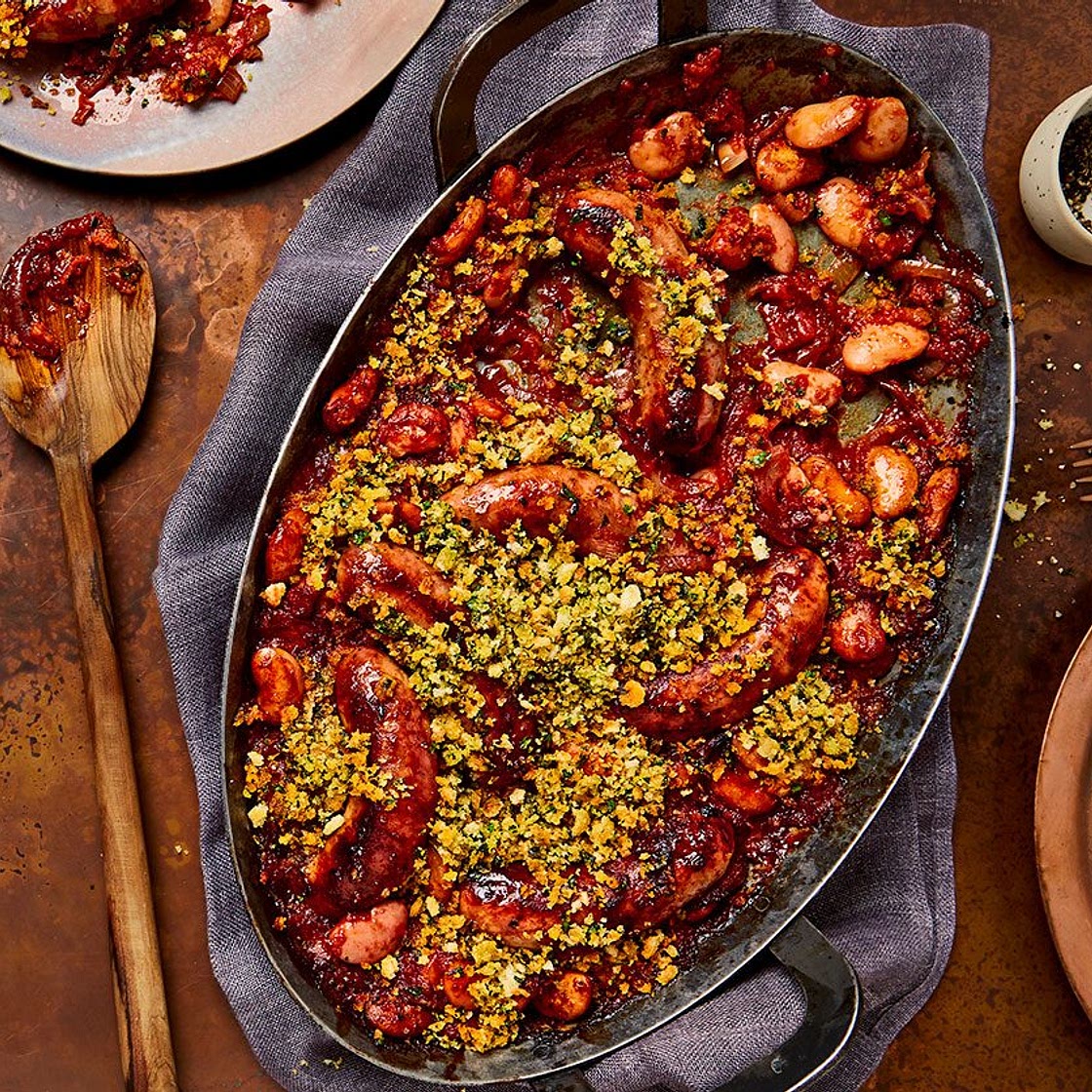One-pot sausage casserole with garlic breadcrumbs