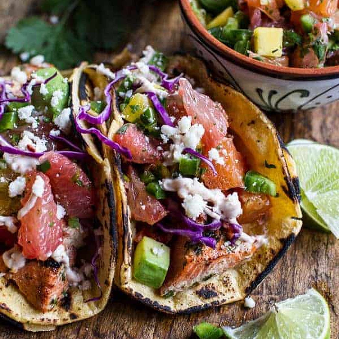 Cuban Fish Tacos with Citrus Mango Slaw + Chipotle Lime Crema