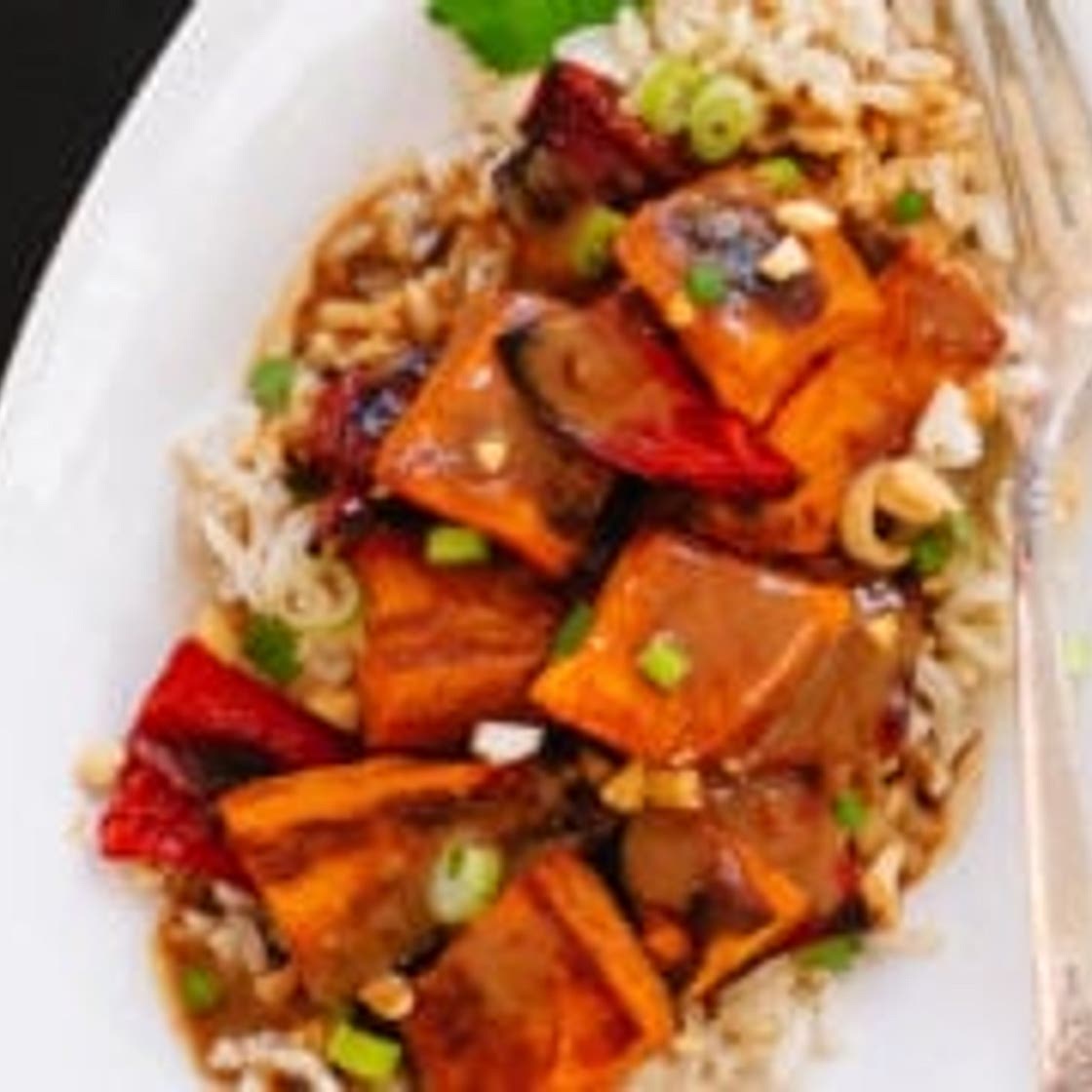 Spicy Thai Peanut Sauce over Roasted Sweet Potatoes and Rice
