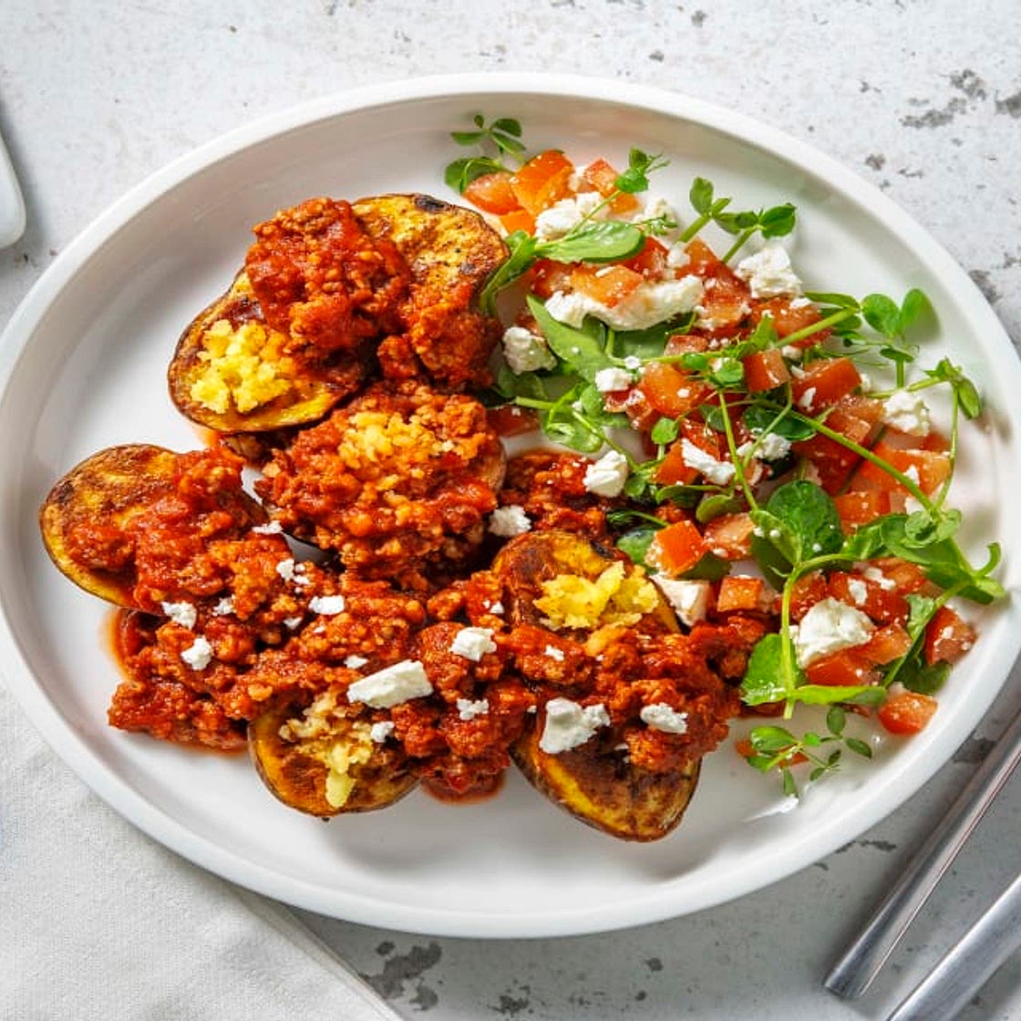 Greek Inspired Lamb Ragu Jacky-P with Tomato and Pea Shoot Salad