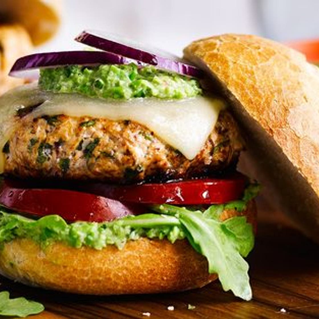 Spiced turkey burgers with pea guacamole