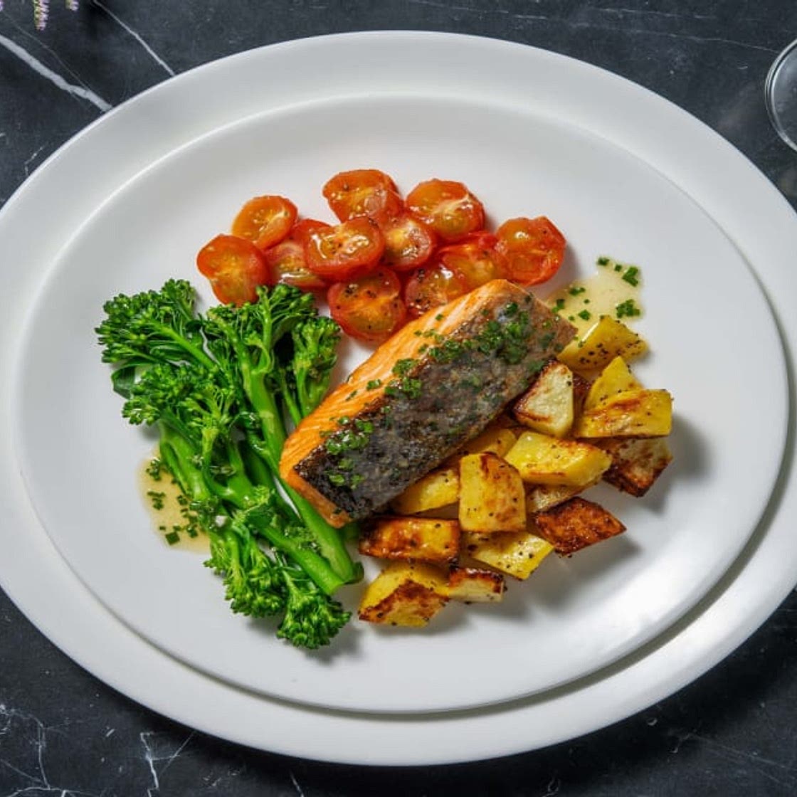 Pan-Seared Salmon and Chive Butter with Roast Potatoes, Tomatoes and Tenderstem® Broccoli