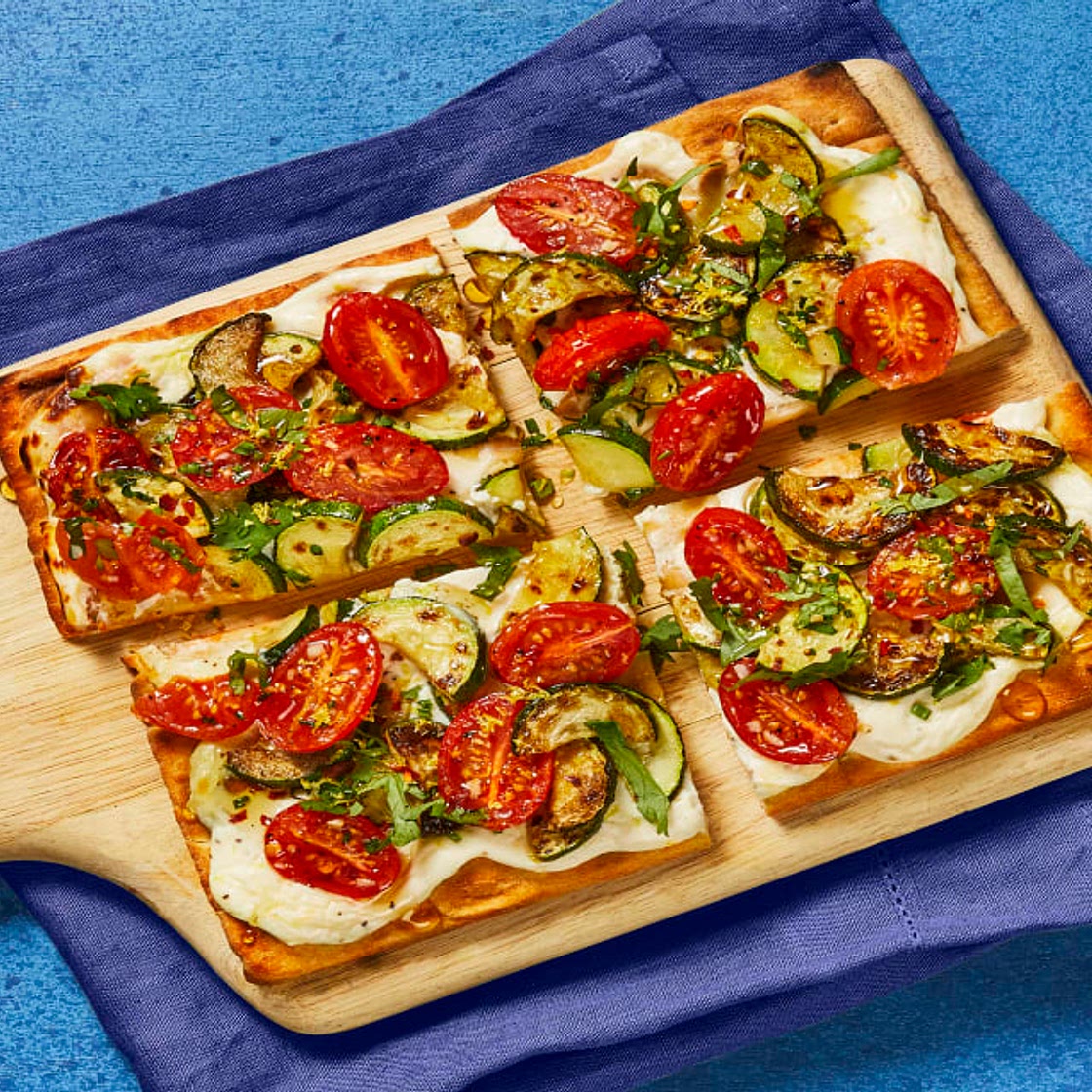 Zucchini & Tomato Flatbreads with Lemon Ricotta, Fresh Herbs, Honey & Chili Flakes