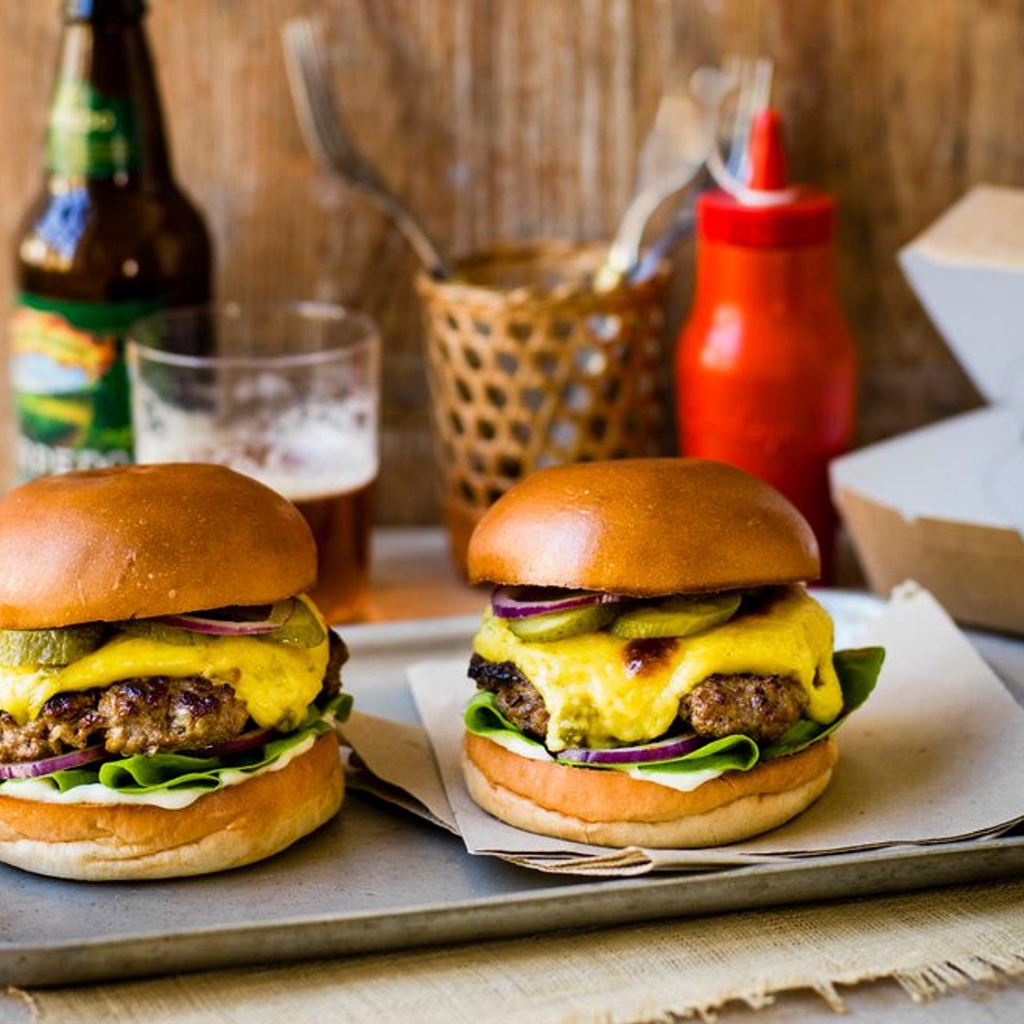 Smashed burgers with jalapeño rarebit