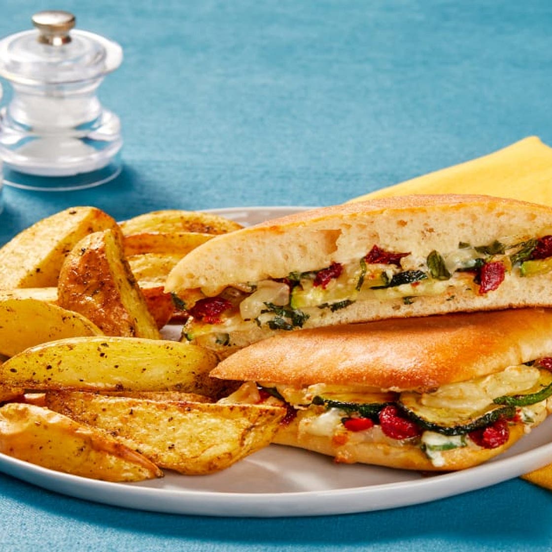 Zucchini & Sun-Dried Tomato Panini with Melty Mozz, Basil Sauce & Italian-Seasoned Potato Wedges