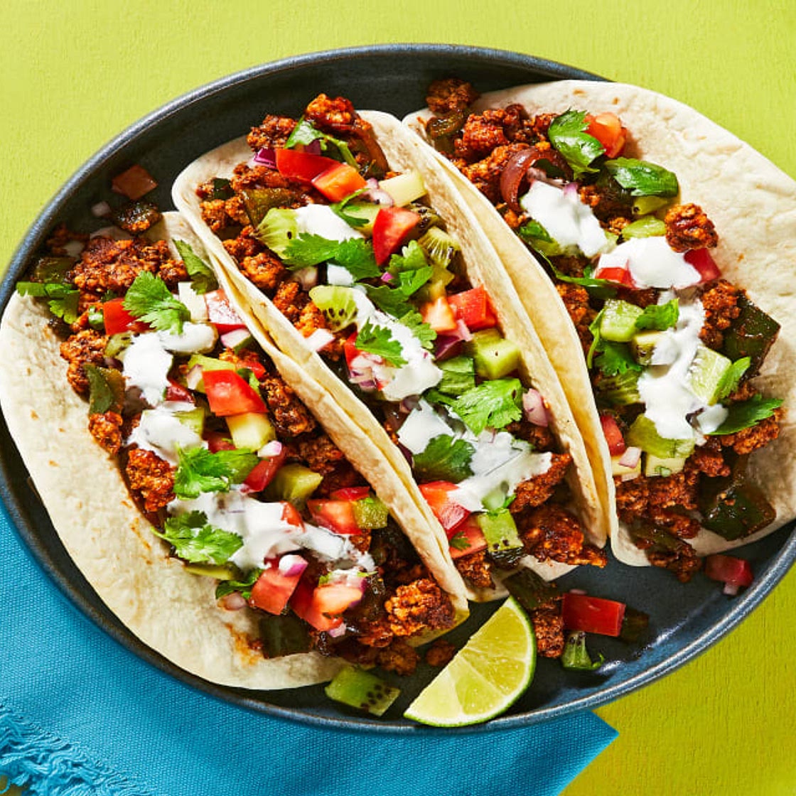 Pork and Poblano Tacos with Kiwi Salsa and Lime Crema