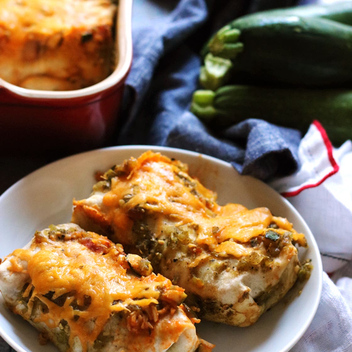 Smothered Salsa Verde Burritos with Chipotle Zucchini and Pinto Beans